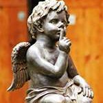 cupid-sitting-on-stone